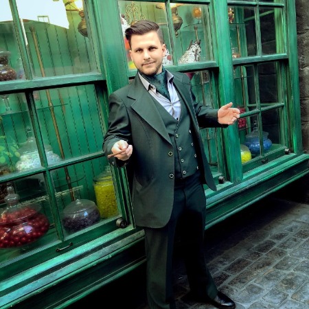 Dyllan Christopher looks dapper in a suit.